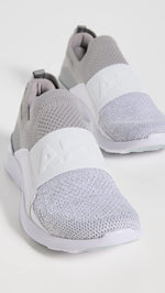APL Women's Techloom Bliss Sneaker, Cement/White/Melange, 8 Medium US