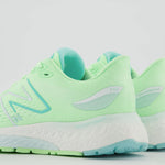 New Balance Women's Fresh Foam X 880 V12 Running Shoe, Vibrant Spring Glo/Light Surf, 9 Wide