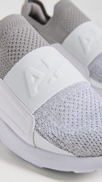 APL Women's Techloom Bliss Sneaker, Cement/White/Melange, 8 Medium US