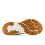 New Balance Women's Fresh Foam Arishi V4 Running Shoe, Raw Sugar/Gum, 8 Wide