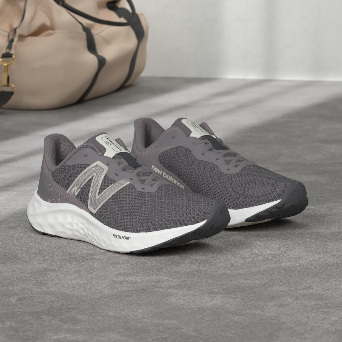 New Balance Women's Fresh Foam Arishi V4 Running Shoe, Magnet/Team Cream/Light Gold Metallic, 5