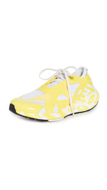 adidas by Stella McCartney Women's Ultraboost 22 Graphic Sneaker, Shock Yellow/FTWR White, 9.5 Medium US