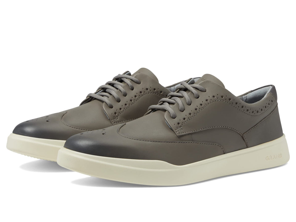 Cole Haan Men's Grand Crosscourt Wingtip Sneaker, Ironstone Nubuck/Ivory, 7