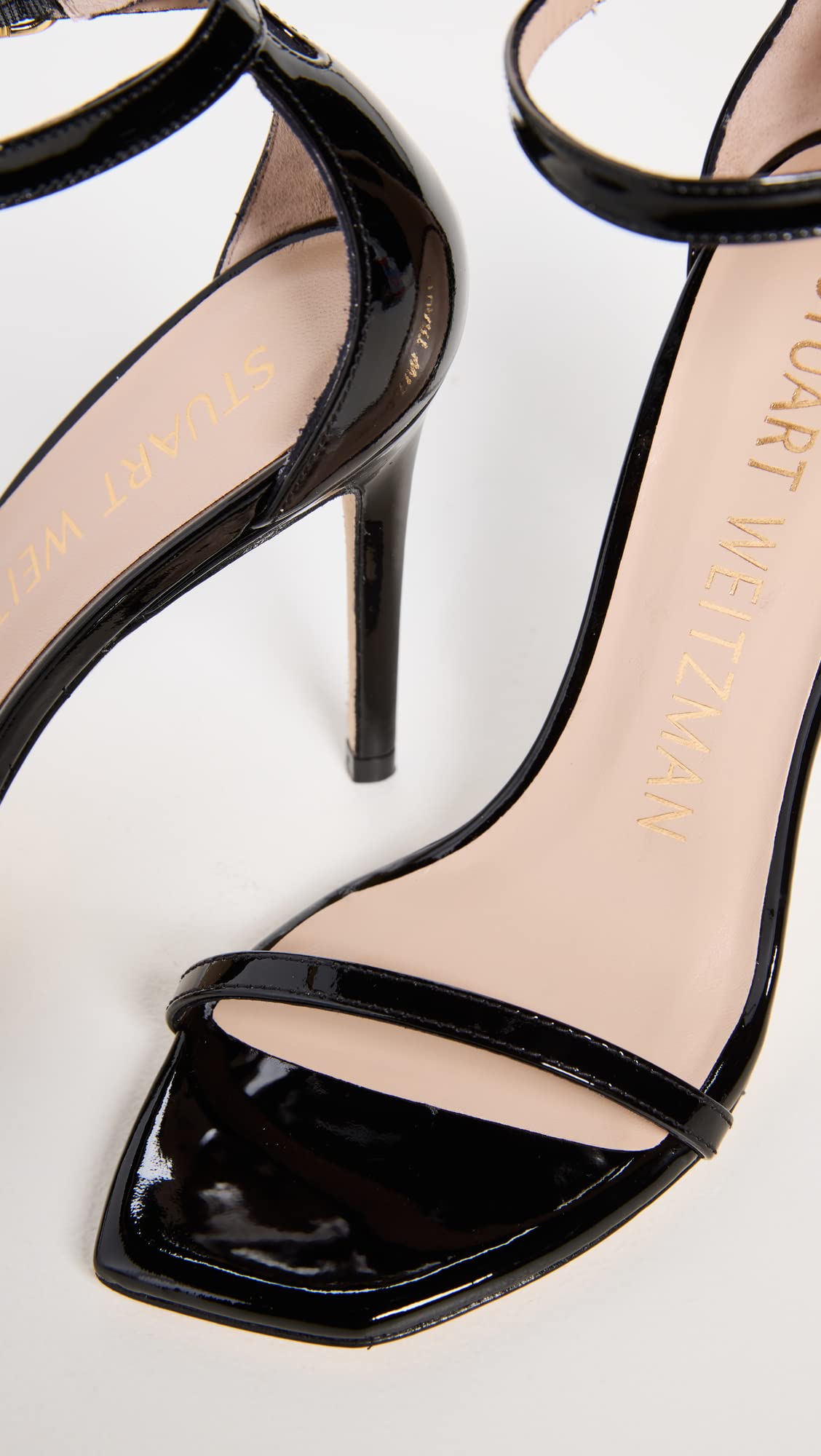 Stuart Weitzman Women's Nudist Curve 100 Patent Sandals, Black, 7 Medium US