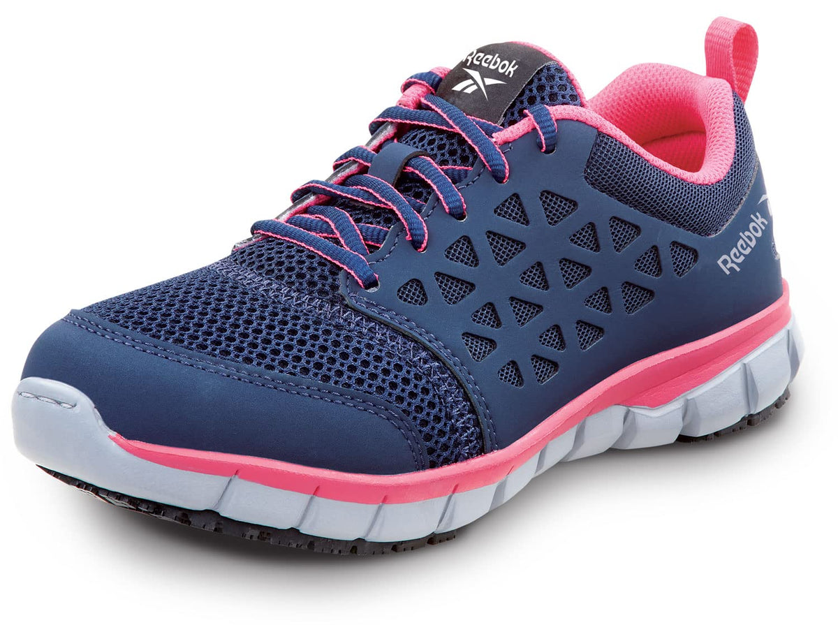 Reebok Work Sublite Cushion Work, Women's, Athletic Style, MaxTrax Slip Resistant, Soft Toe Work Shoe 9.5 Wide Navy/Pink