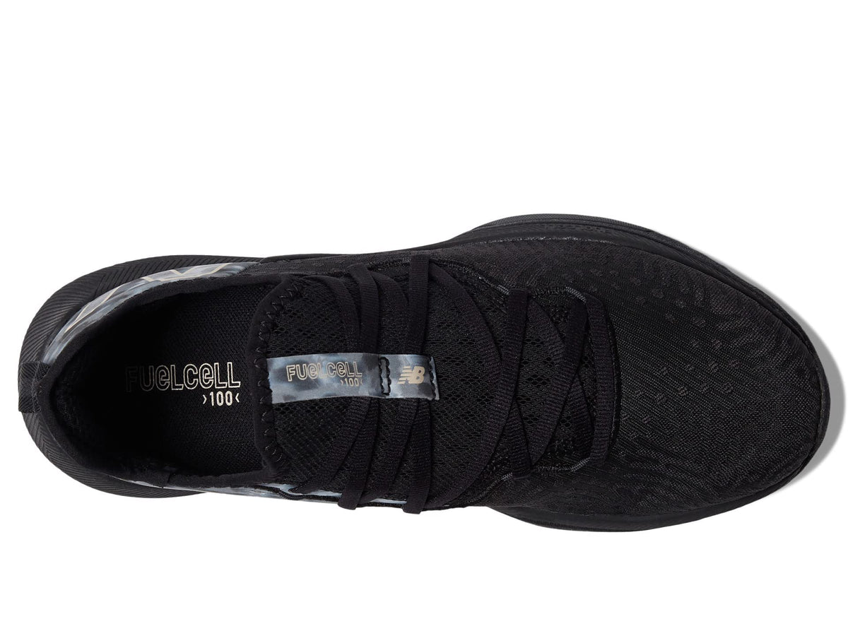 New Balance womens Fuelcell 100 V1 Cross Trainer, Black/Rose Gold Metallic, 7.5 US